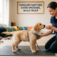 Common Puppy Training Mistakes to Avoid: A professional dog trainer uses positive reinforcement to train a Golden Retriever puppy during an indoor obedience training session.