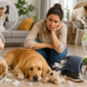 Common Dog Behavior Problems showing a dog with barking, destructive chewing, aggression, anxiety, and leash pulling behaviors